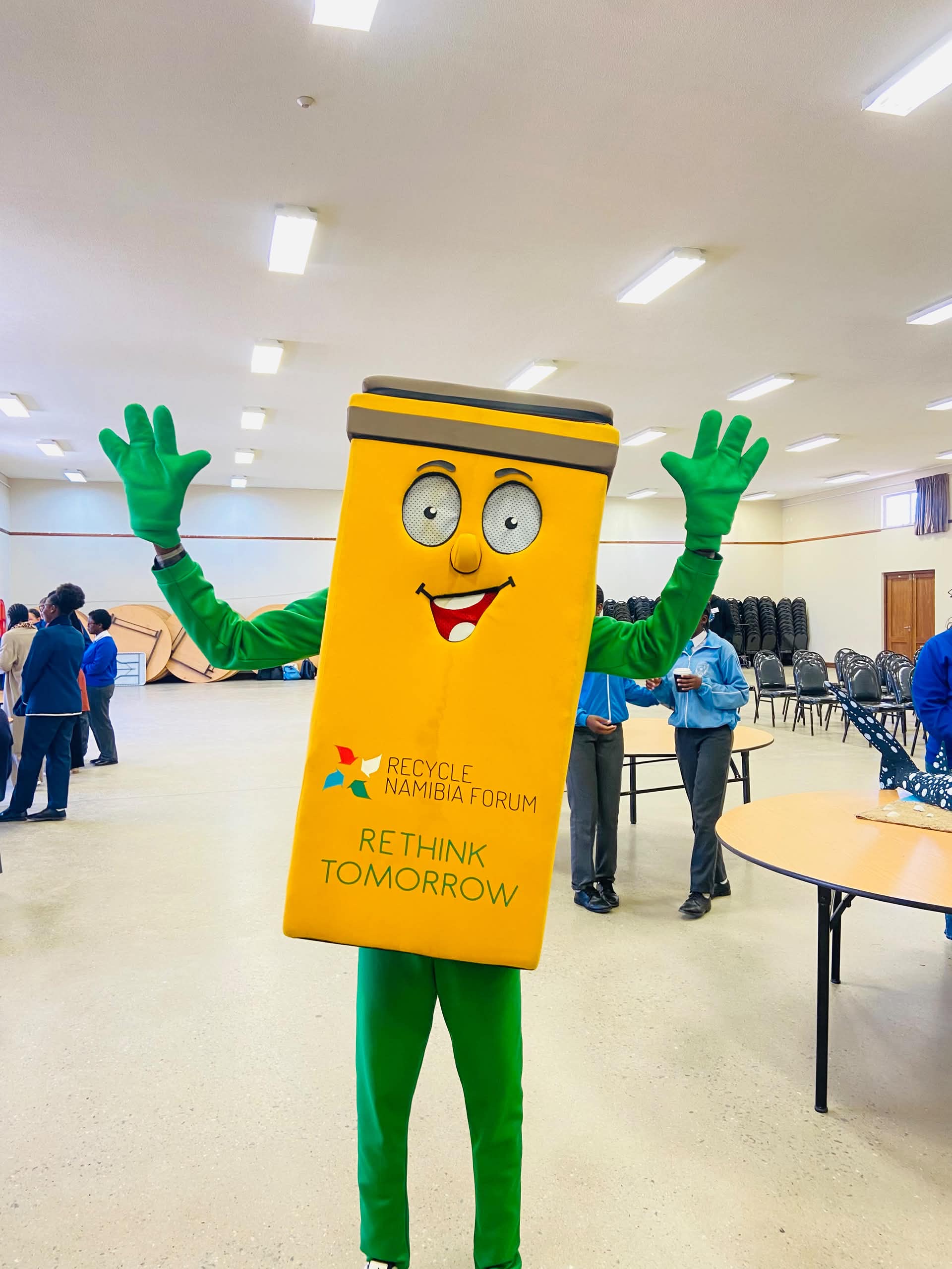 The Recycle Namibia Forum recycling-bin mascot waving